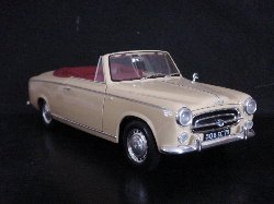 Peugeot 403 Cabriolet 1959 Grand luxe 8Cv de couleur orange pastel, int�rieur rouge fonc� (Vue c�t� passager)